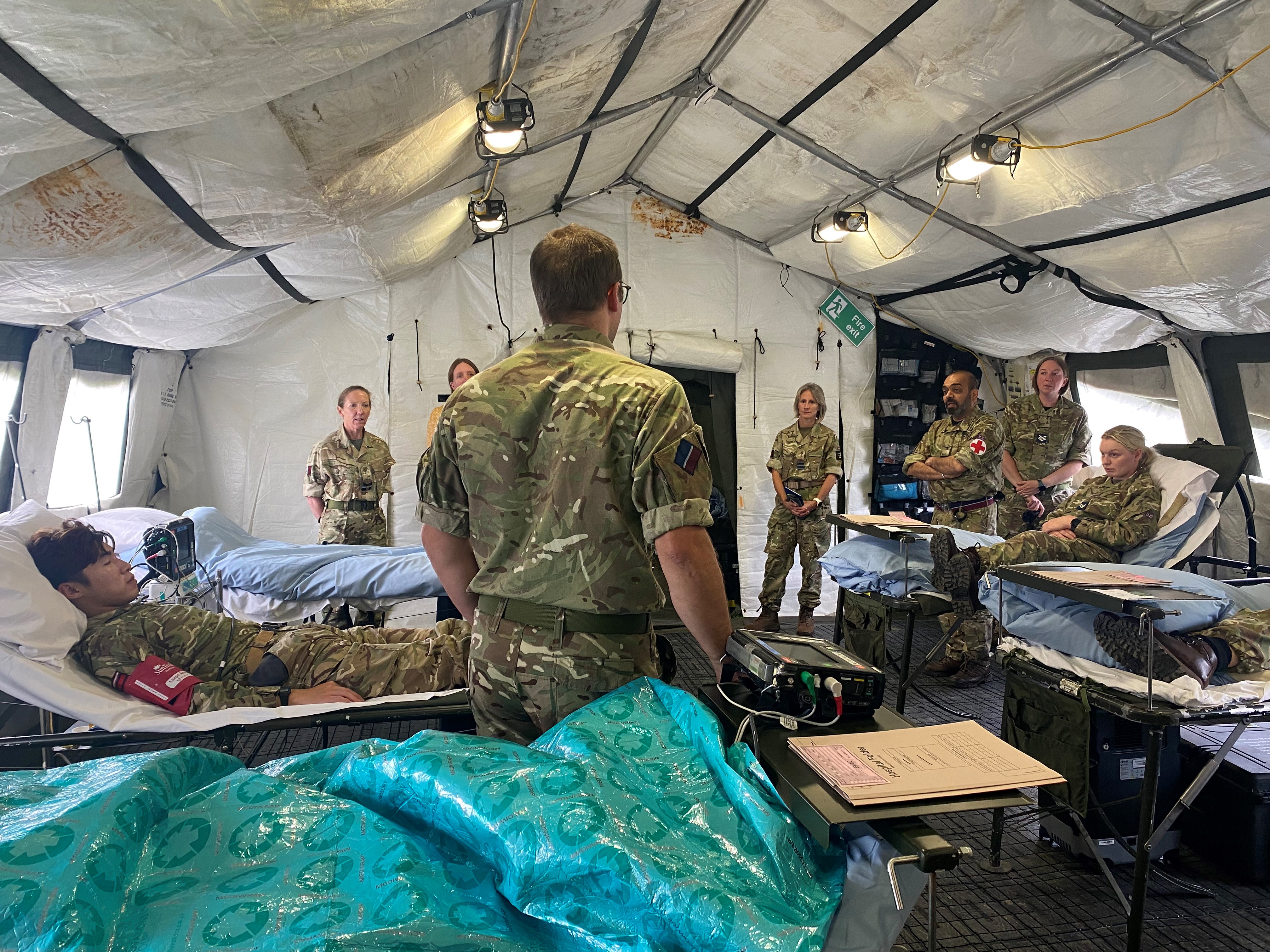 Photo - Tactical Medical Wing on Exercise Athena Dragon 23. Image shows a ward scenario, including patients and medical personnel